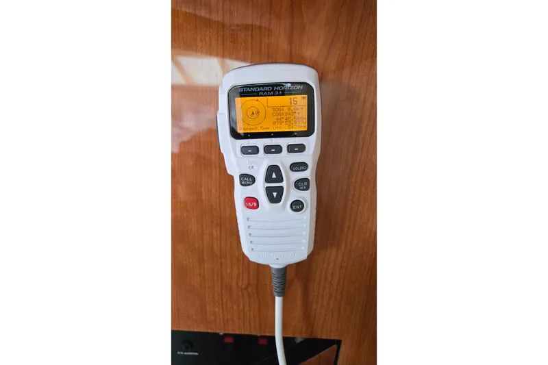 Slide: The Image of Luxurious seating area on a 2001 Sea Ray 400 Sedan Bridge yacht with tropical cushions. - 10