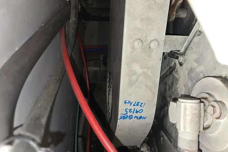 Slide: The Image of Rear view of 2001 Sea Ray 400 Sedan Bridge with fishing rod holders over water. - 17