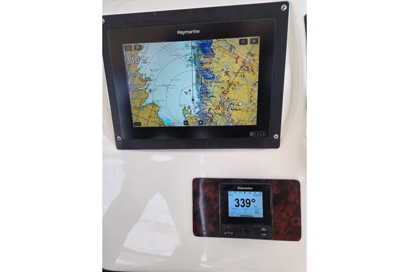 Slide: The Image of Control panel on 2001 Sea Ray 400 Sedan Bridge displaying battery and system status. - 3