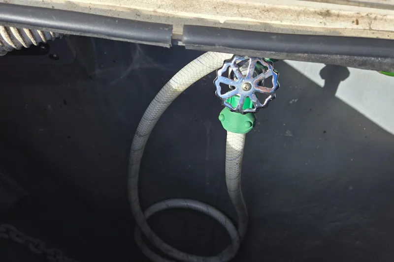 Slide: The Image of Luxurious cabin interior of 2001 Sea Ray 400 Sedan Bridge yacht, featuring a cozy bed. - 46