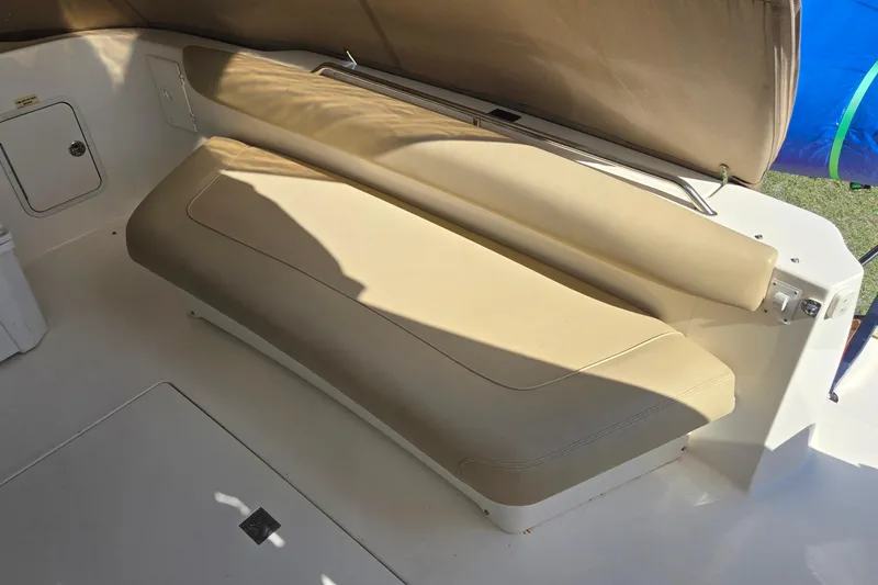 Slide: The Image of Cockpit of 2001 Sea Ray 400 Sedan Bridge with steering wheel and control panel. - 8