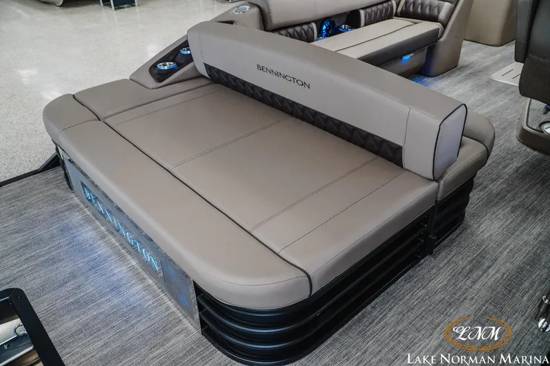 Slide: The Image of 2026 Bennington 24LXSSB boat interior with luxurious seating at Lake Norman Marina. - 10