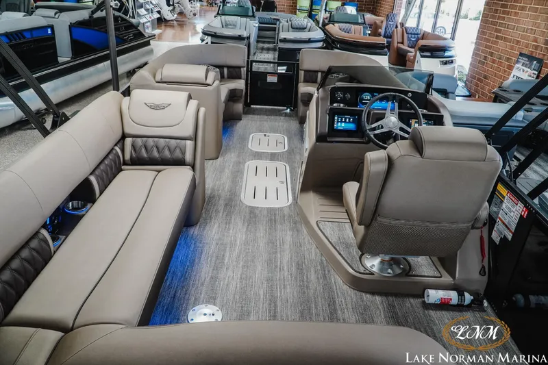 Slide: The Image of Luxurious interior of 2026 Bennington 24LXSSB pontoon boat at Lake Norman Marina. - 11