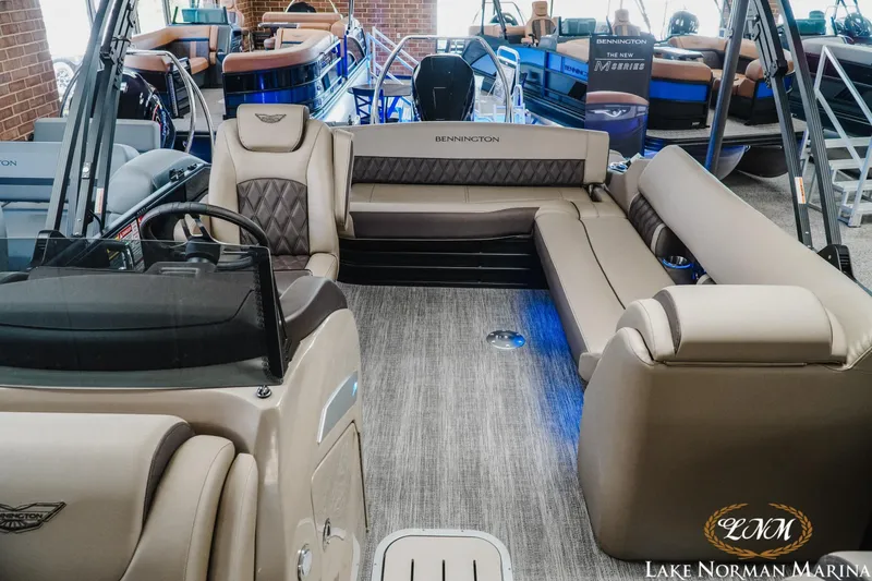 Slide: The Image of 2026 Bennington 24LXSSB pontoon boat interior with luxurious seating and modern design. - 20