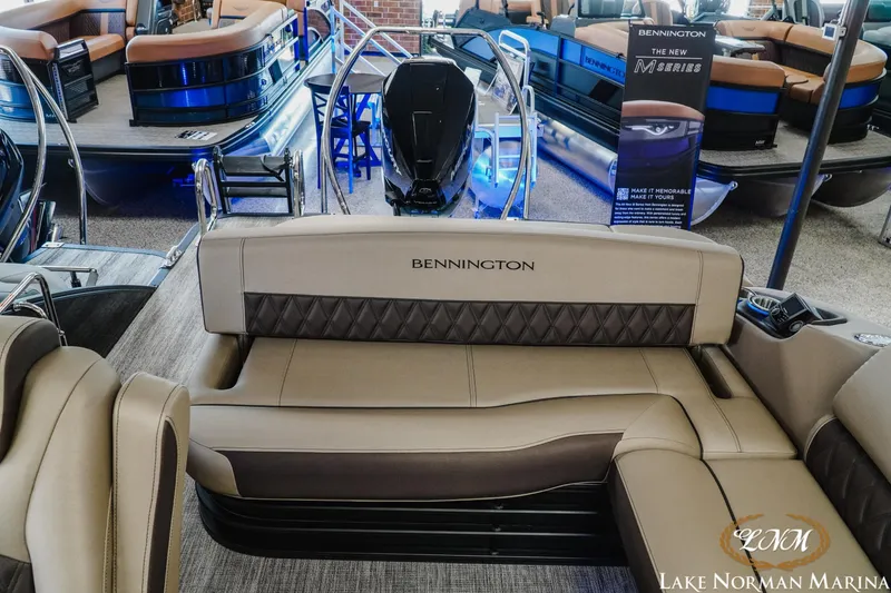 Slide: The Image of 2026 Bennington 24LXSSB luxury pontoon boat interior at Lake Norman Marina. - 21