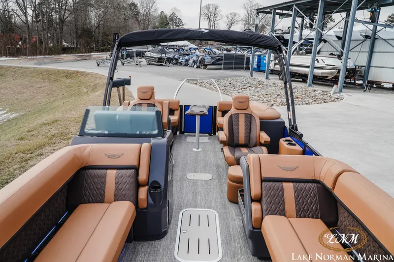 Slide: The Image of 2026 Bennington 24MFB pontoon boat with luxurious seating at Lake Norman Marina. - 13
