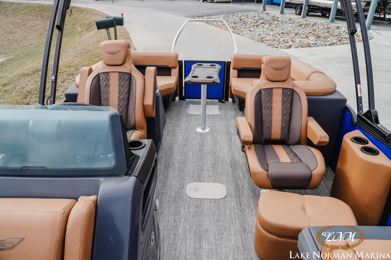 Slide: The Image of Luxurious interior of 2026 Bennington 24MFB pontoon boat with plush seating and modern design. - 17