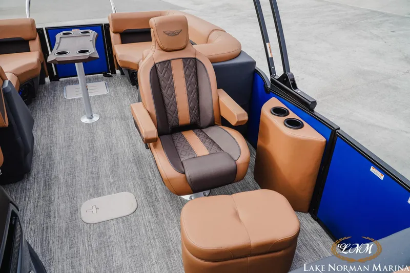 Slide: The Image of Luxurious interior of 2026 Bennington 24MFB pontoon boat with plush seating and modern design. - 18