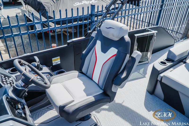 Slide: The Image of Captain's seat of 2026 Evotti 723CS boat at Lake Norman Marina. - 19
