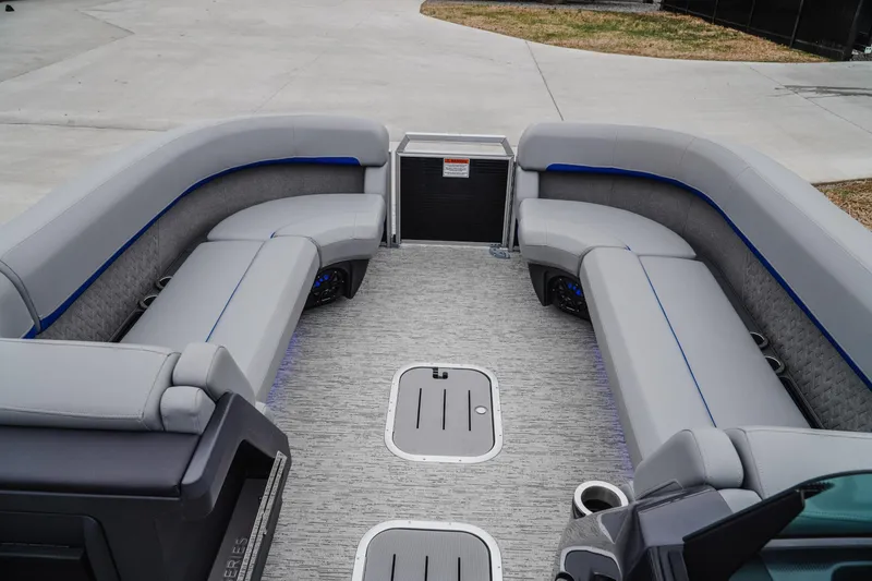 Slide: The Image of Luxurious interior of 2025 Bennington 24MSB pontoon boat with spacious seating. - 12