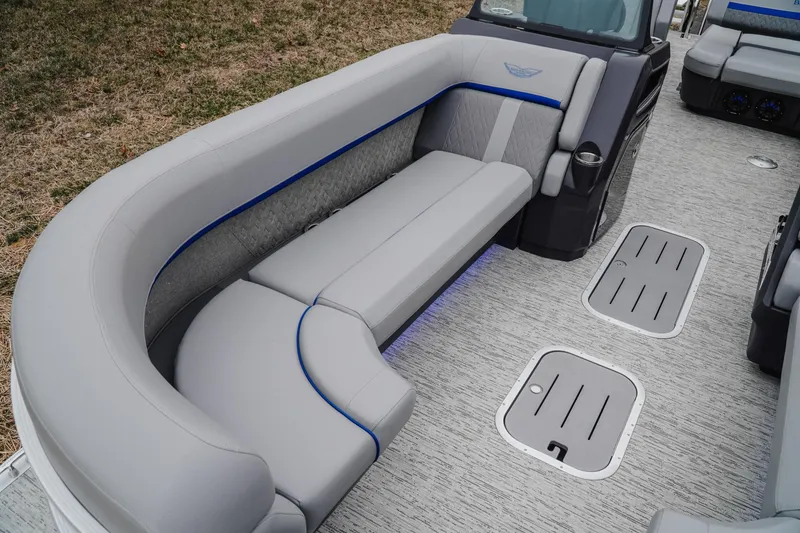 Slide: The Image of Luxurious seating on 2025 Bennington 24MSB pontoon boat with modern design and gray upholstery. - 15