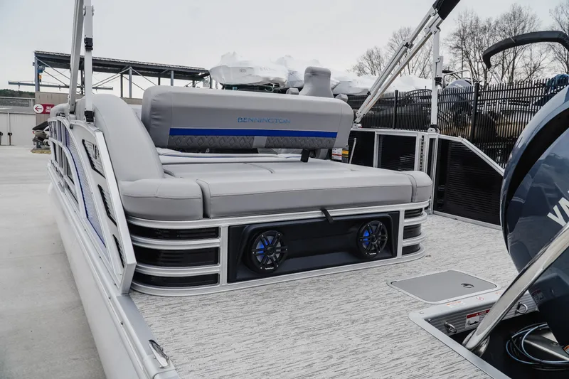 Slide: The Image of 2025 Bennington 24MSB pontoon boat with sleek seating and modern design features. - 5