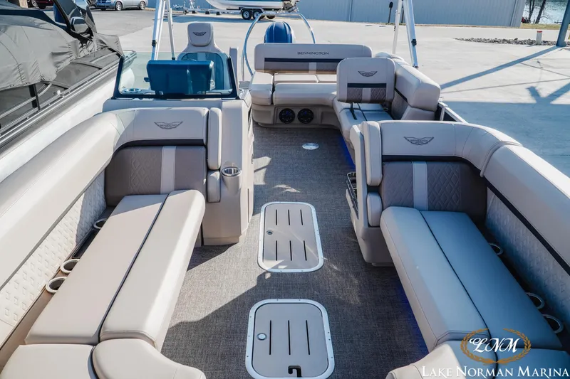 Slide: The Image of 2025 Bennington 24MSB pontoon boat interior with luxurious seating at Lake Norman Marina. - 13