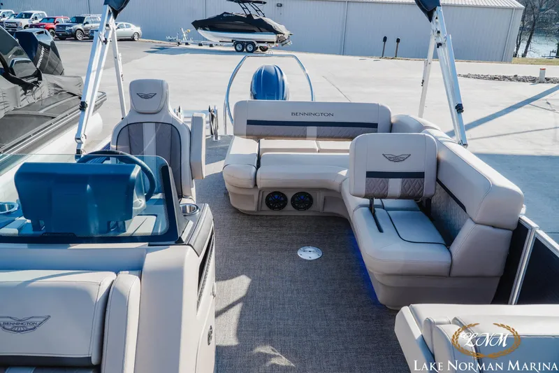 Slide: The Image of 2025 Bennington 24MSB pontoon boat interior with luxurious seating at Lake Norman Marina. - 15