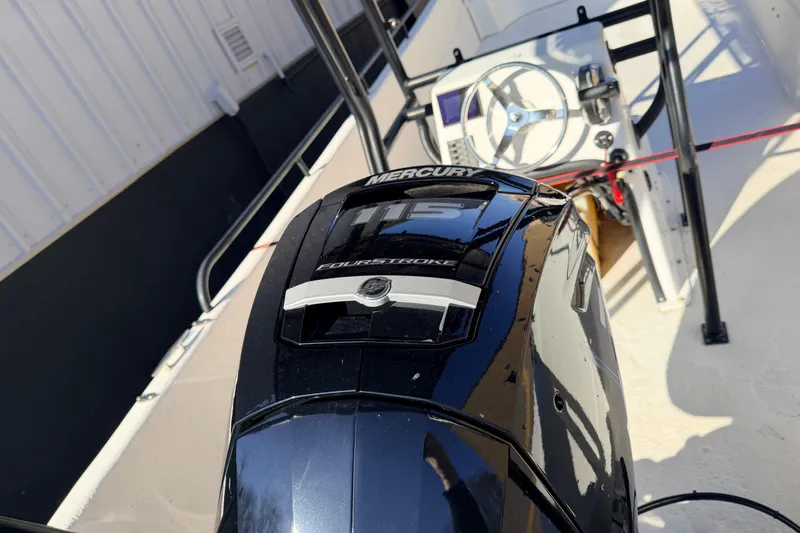 Slide: The Image of 2017 Carolina Skiff 258 DLV boat with Mercury 115 FourStroke engine. - 7