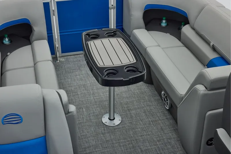 Slide: The Image of 2026 Sun Tracker Party Barge 24 XP3 on trailer in parking lot. - 19