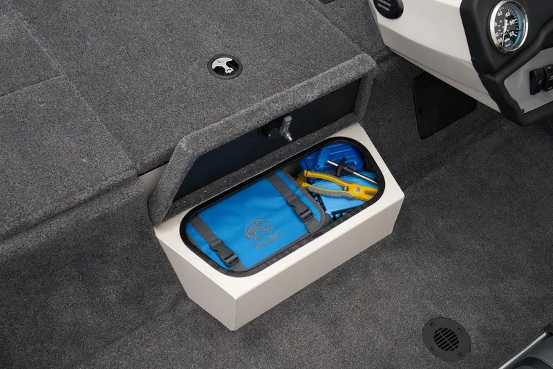Slide: The Image of 2026 Ranger RT198P boat interior with gray carpet and blue-accented seats. - 23