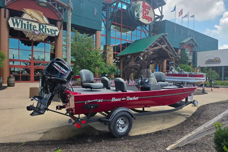 The Image of 2026 Tracker Bass Tracker Classic XL boat displayed outside Bass Pro Shops. - 0