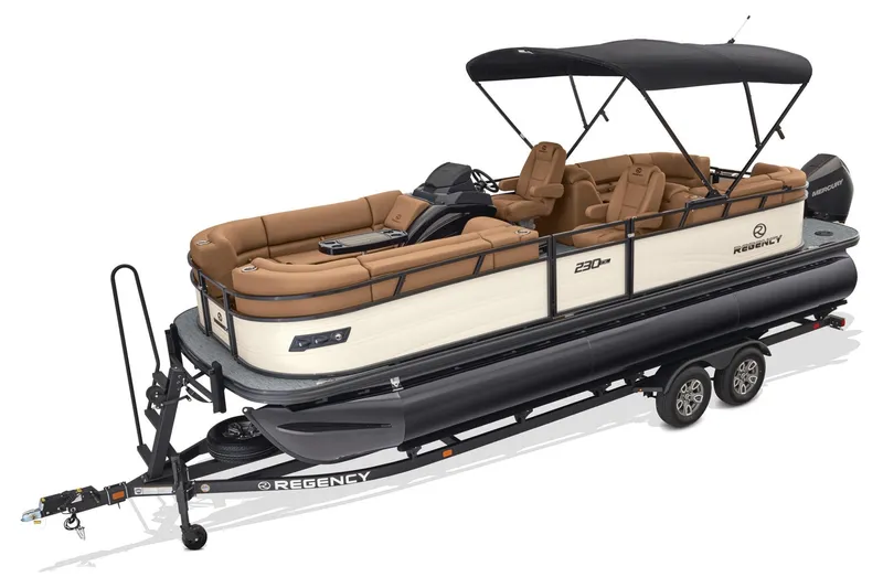 Slide: The Image of Rear view of a 2026 Regency 230 DL boat on a trailer under a clear blue sky. - 2
