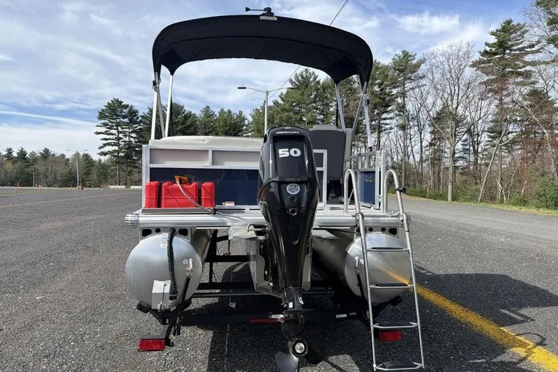 Slide: The Image of 2026 Sun Tracker Bass Buggy 16 XL Select pontoon boat with 50 HP Mercury engine. - 7