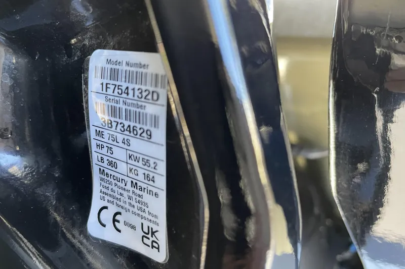 Slide: The Image of Label on Mercury Marine engine, model ME 75L 4S, with specifications and serial number. - 72