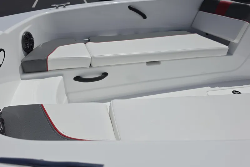 Slide: The Image of 2026 Tahoe T18 boat interior with white and gray seating, red accents. - 5