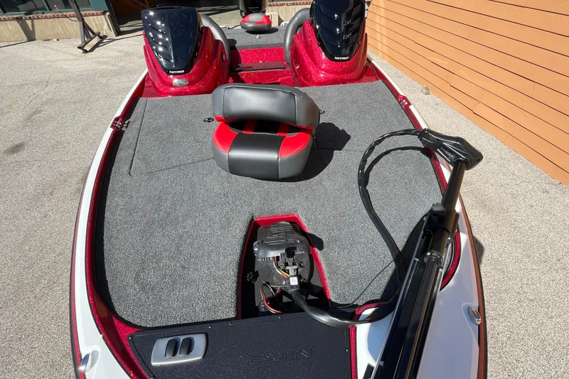 Slide: The Image of 2026 Nitro Z17 boat with red accents and seating on a sunny day. - 96