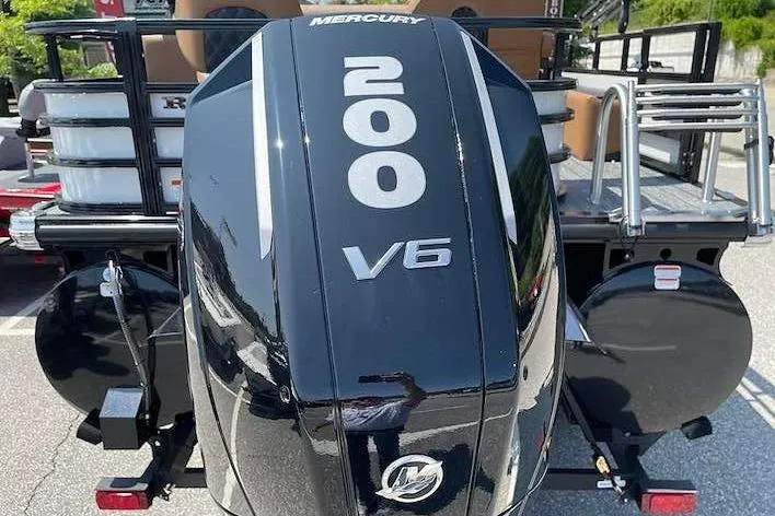 Slide: The Image of A Mercury 200 V6 outboard motor is mounted on a Ranger 223FC boat. - 5