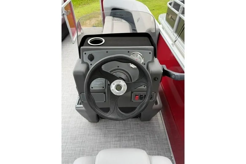 Slide: The Image of Steering console of 2026 Sun Tracker Party Barge 16 DLX pontoon boat. - 6