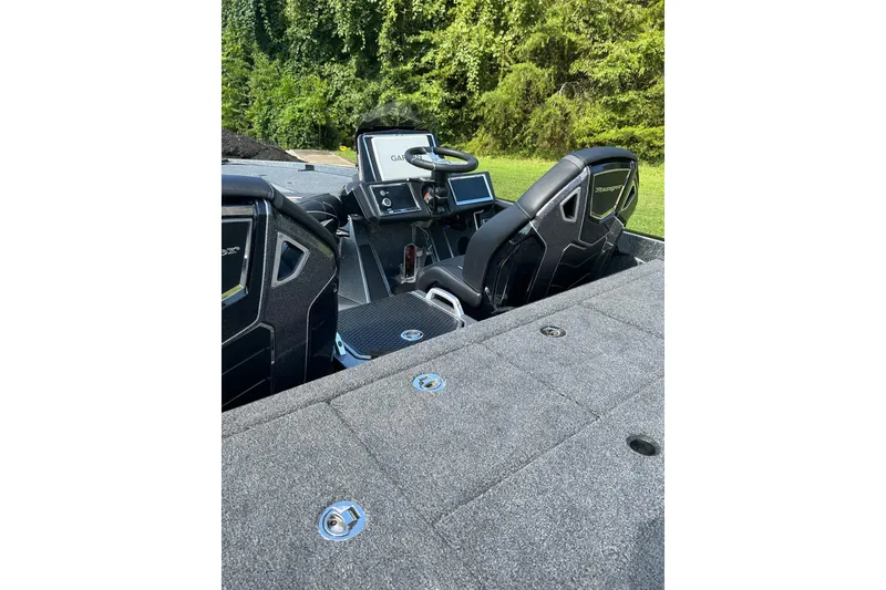 Slide: The Image of 2026 Ranger Z520R Cup-Equipped boat interior with advanced navigation system and plush seating. - 3