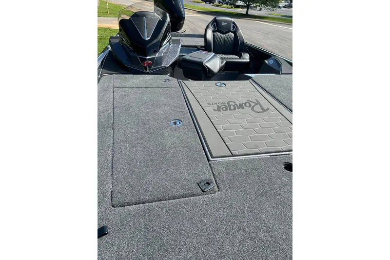 Slide: The Image of 2026 Ranger Z520R Cup-Equipped boat interior with sleek seating and textured flooring. - 5