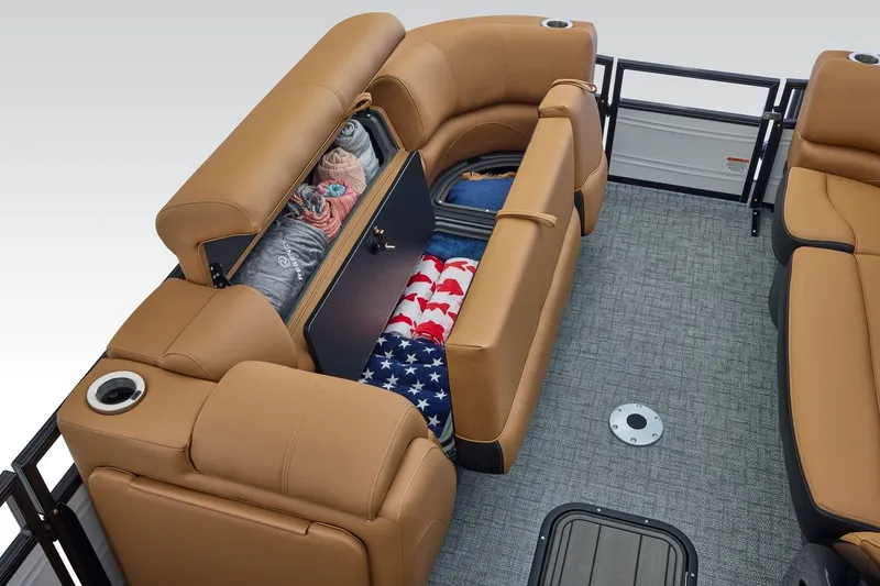 Slide: The Image of Luxurious 2026 Regency 230 DL boat interior with tan captain's chair and sleek black console. - 13