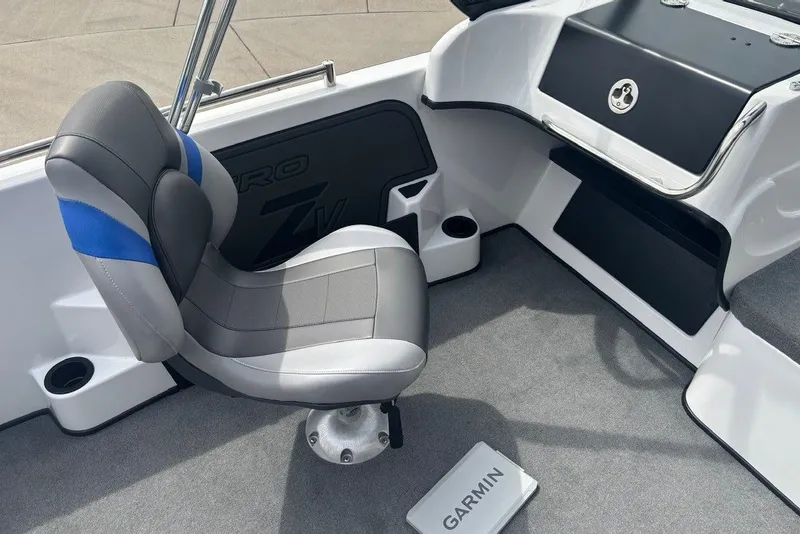 Slide: The Image of 2026 Nitro ZV19 Sport Pro boat interior with gray seat and Garmin device. - 14