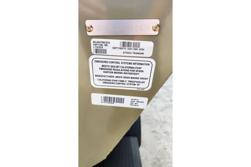 Slide: The Image of Sticker on 2026 Tracker Pro Team 195 boat showing emissions control information. - 58