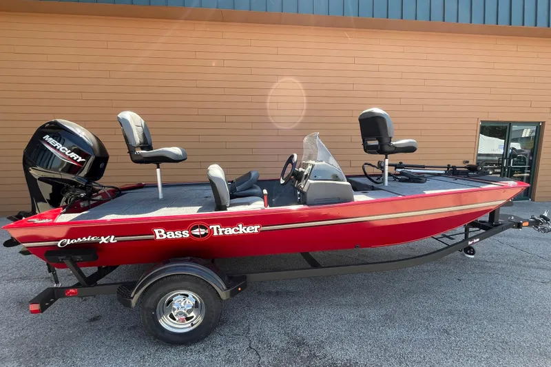 The Image of 2026 Tracker Bass Tracker Classic XL boat, red, parked on trailer. - 0