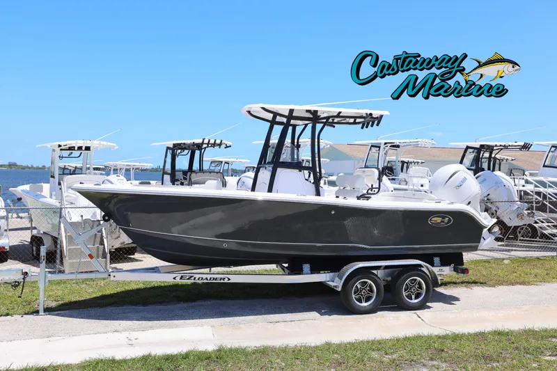 The Image of 2026 Sea Hunt Ultra 219 boat on trailer at Castaway Marine dealership. - 0