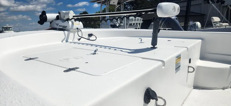 Slide: The Image of 2012 Carolina Skiff 218 DLV with fishing gear on deck. - 4