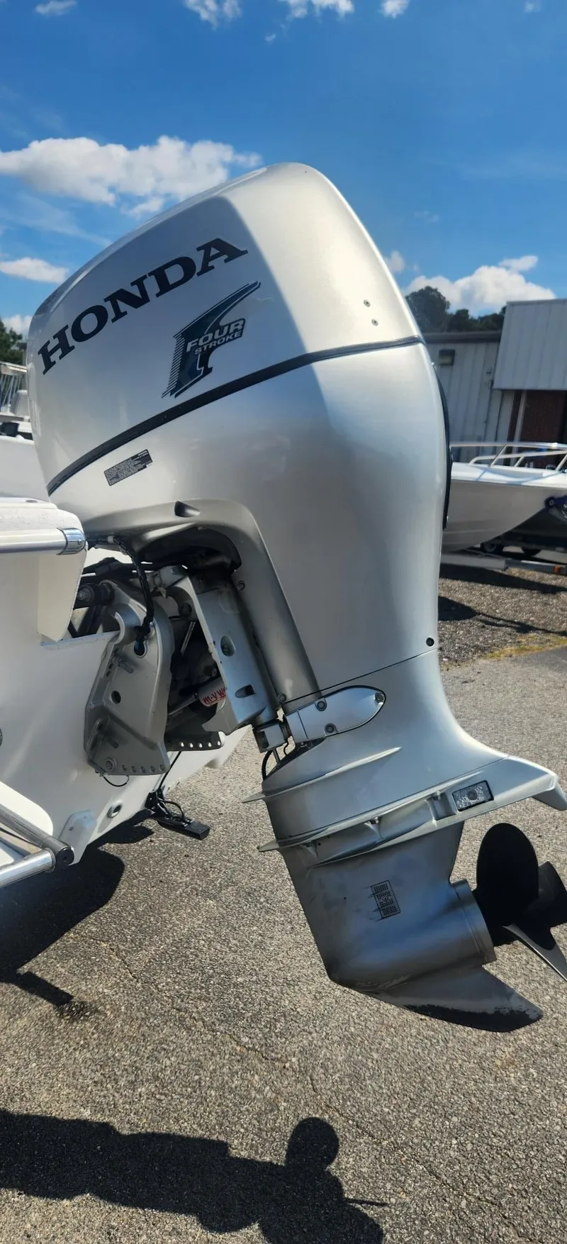Slide: The Image of Honda outboard motor on a 2012 Carolina Skiff 218 DLV. - 6