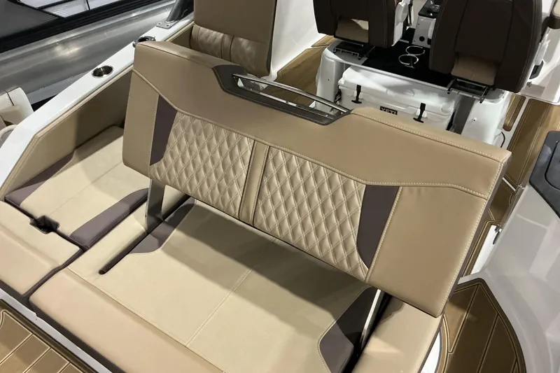 Slide: The Image of Luxurious seating on 2026 Monterey Elite 25 OB boat with diamond-stitched upholstery. - 20