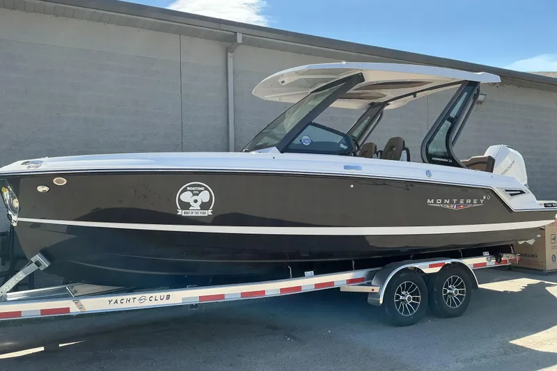 The Image of 2026 Monterey Elite 25 OB boat on trailer, parked outdoors. - 7