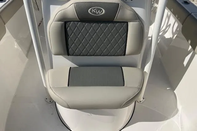 Slide: The Image of 2026 Key West 203 FS boat seat with quilted design and KW logo. - 12