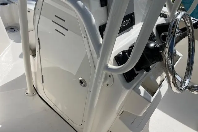 Slide: The Image of 2026 Key West 203 FS boat console with steering wheel and control panel. - 7