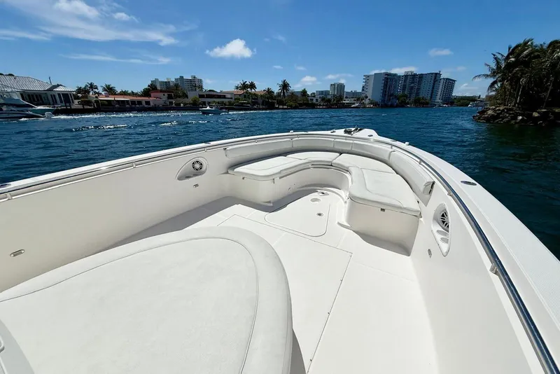 Slide: The Image of 2014 Stamas 390 Tarpon boat with spacious seating, cruising on a sunny day. - 27