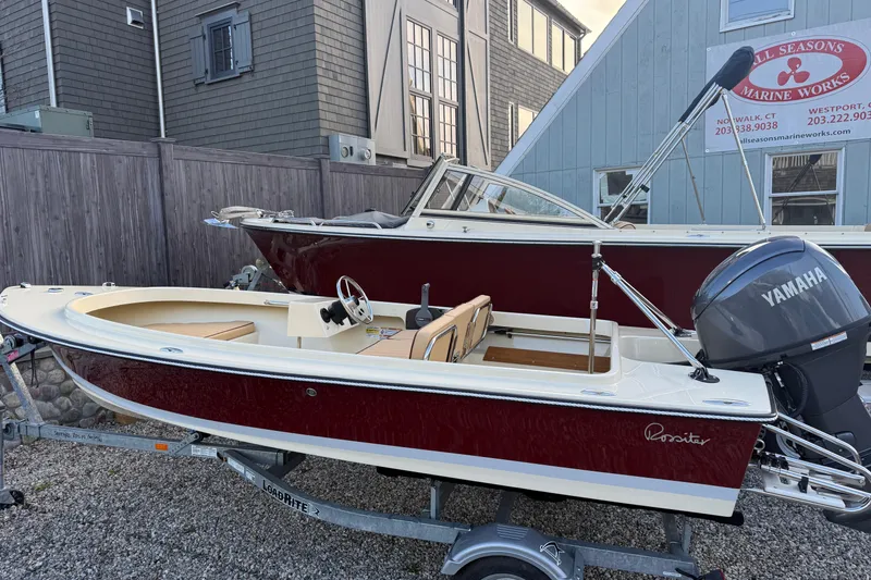 Slide: The Image of 2026 Rossiter 14 boat with Yamaha engine, displayed at All Seasons Marine Works. - 3