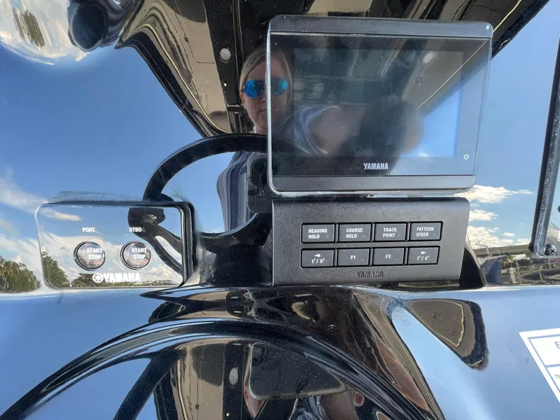 Slide: The Image of Control panel of 2023 Tidewater 320 CC Adventure boat with Yamaha display. - 12