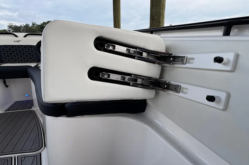 Slide: The Image of 2023 Tidewater 320 CC Adventure boat seat hinge detail. - 25