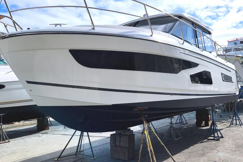 Slide: The Image of 2021 Jeanneau NC Weekender 1095 boat on stands, ready for maintenance. - 2