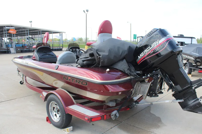 Slide: The Image of 2002 Nitro NX 882 DC boat with Mercury engine on trailer. - 5