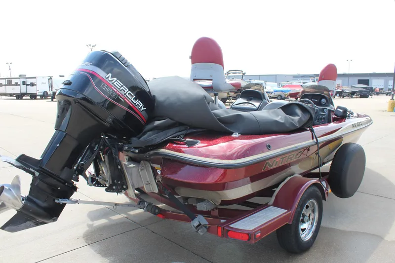 Slide: The Image of 2002 Nitro NX 882 DC boat with Mercury 150 XR6 engine on trailer. - 7