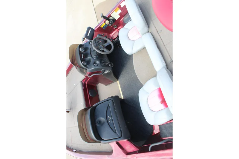 Slide: The Image of Interior of a 2002 Nitro NX 882 DC boat with steering console and seating. - 8